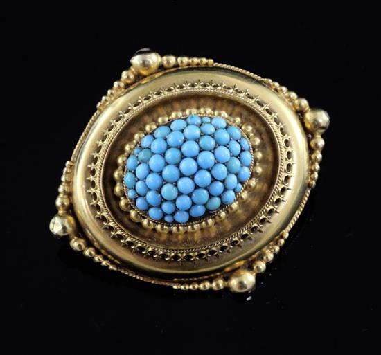 A Victorian gold and turquoise set oval pendant brooch with glazed back, 40mm.